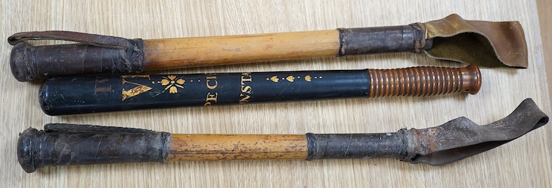 A William IV Victorian overpainted Special Constable truncheon and two bamboo shaft riding crops, largest 46cm. Condition - fair